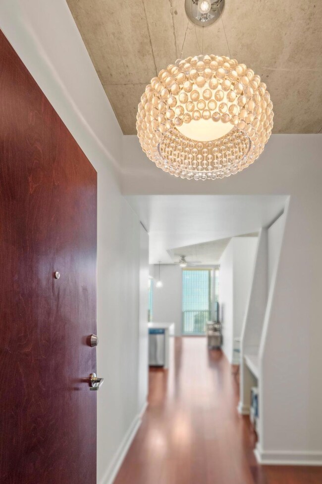 A beautiful lighting fixture in the entry.