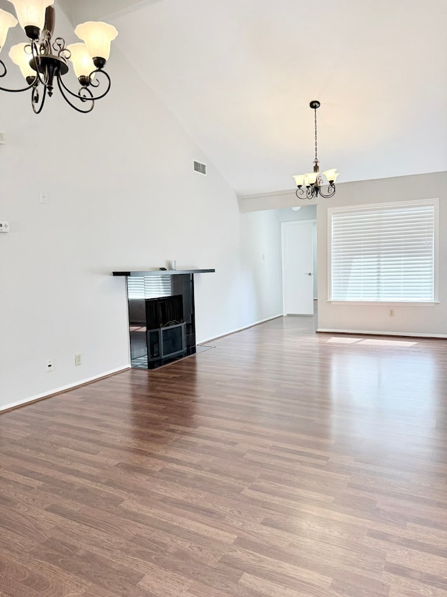 The laminate flooring, the chandeliers and the fir
