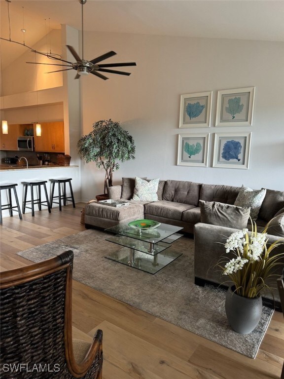 Living room featuring wood finished floors and a c