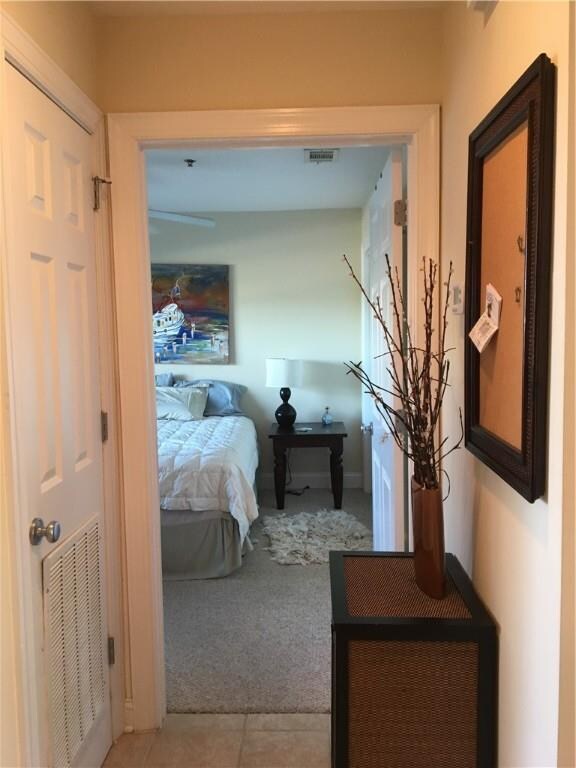 Just passed the laundry, the guest bedroom is on t
