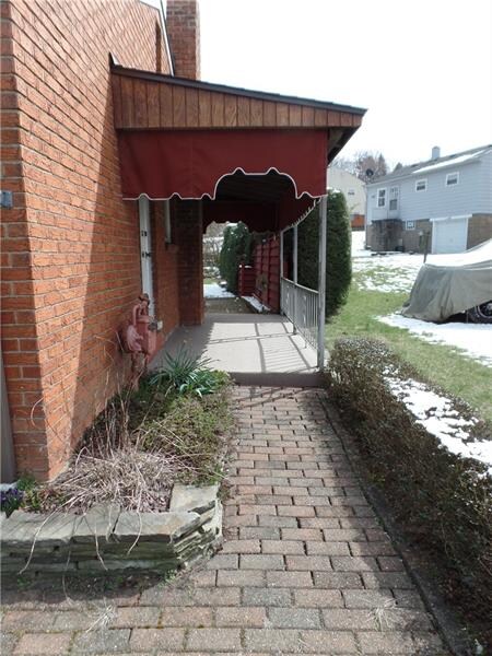 Awnings for the front of the house match the awnin