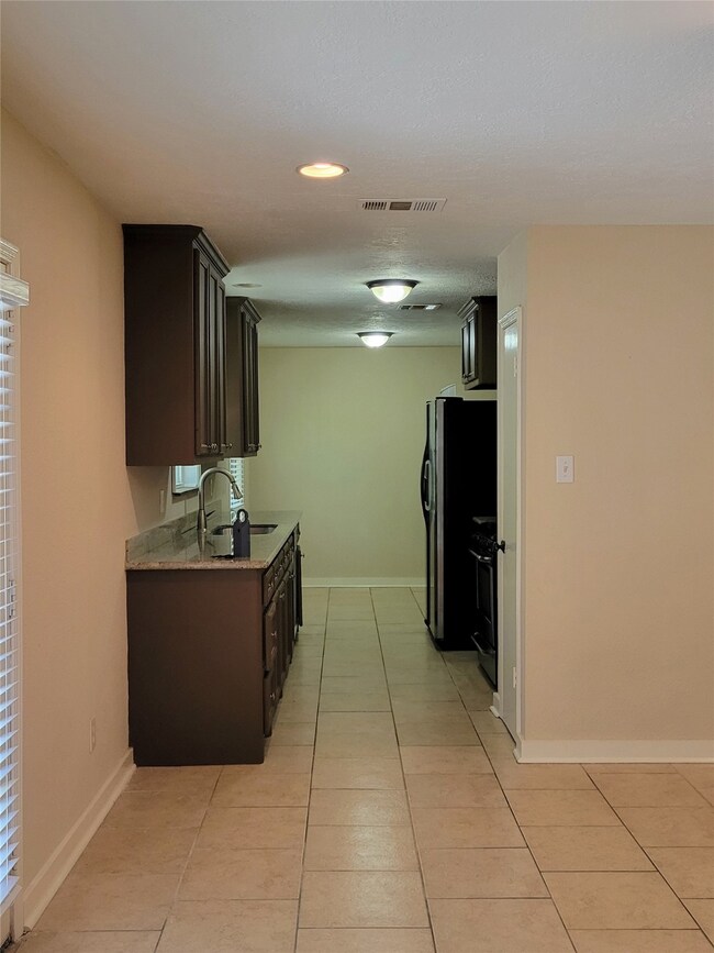 1239 W Donovan St, Houston, TX 77091 - photo 7
