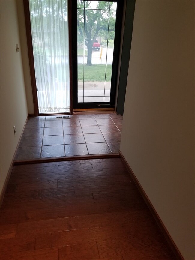 This lovely front entry has a large coat close too
