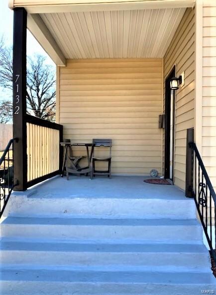 Covered front porch, professionally painted and updated.