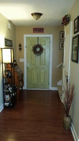 LARGE ENTRYWAY HAS BEAUTIFUL LAMINATE FLOORS AS DOES MOST OF THIS HOME.  HOME HAS ALL BEEN RECENTLY PAINTED INCLUDING MOST CEILINGS AND TRIMWORK.