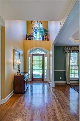 Welcome friends and family into your grand, 2-story foyer.  They'll instantly notice the gleaming hardwoods.