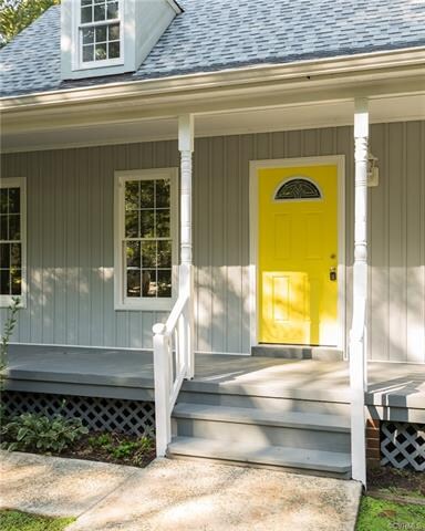 Fun pop of sunshine on the door.