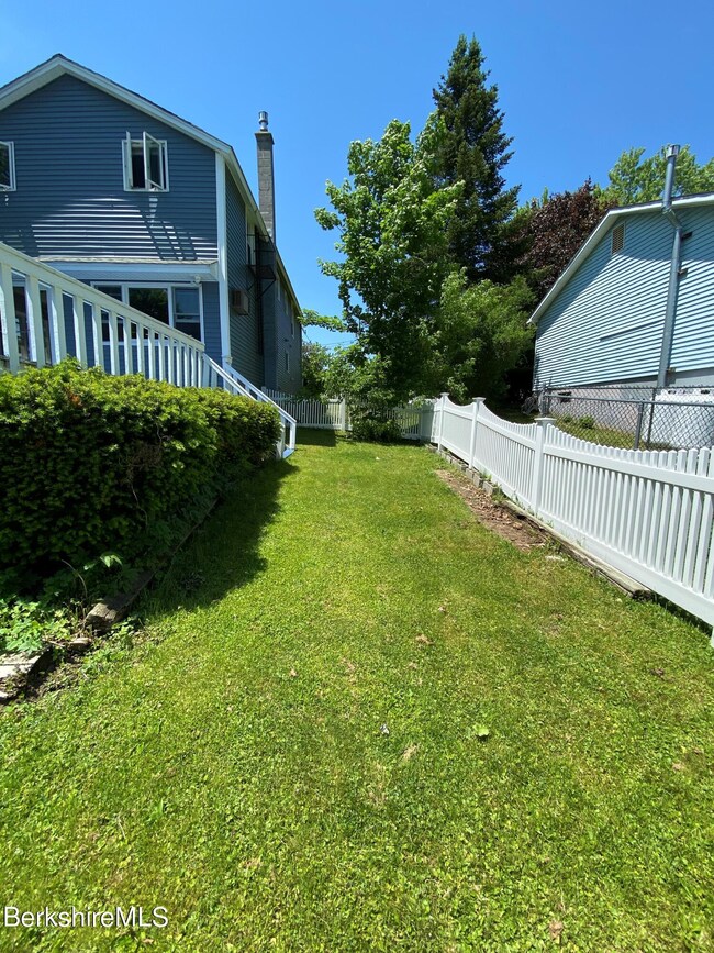 side fenced yard
