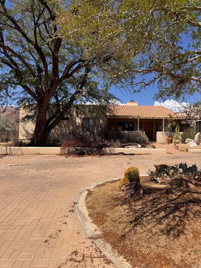 Front exterior with yard on 0.39 acre lot