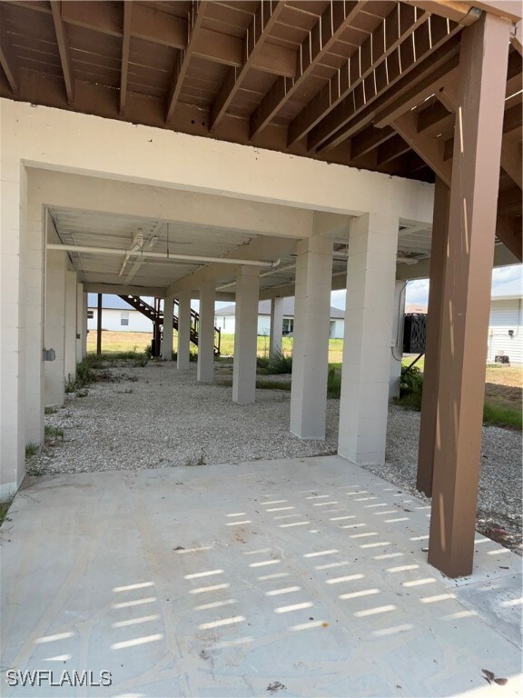 View of patio / terrace featuring driveway and a c