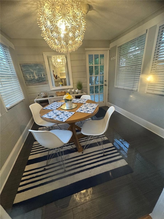 Back Dining/Sunroom and Back door to Lanai
