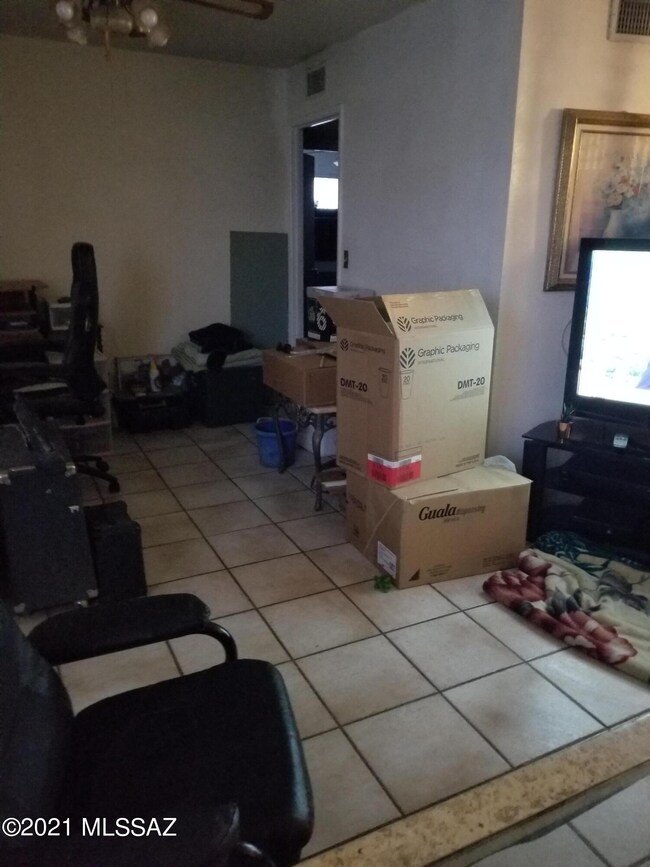 3502 E. Sylvane, Den area & packed boxes