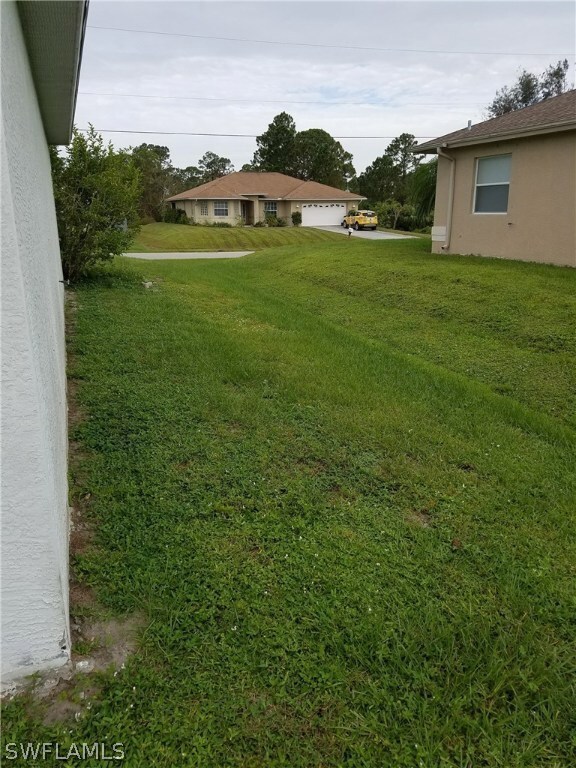 1122 Cabrillo Ave, Lehigh Acres, FL 33971 - photo 5