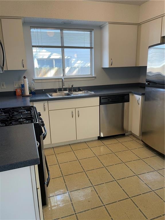 Kitchen featuring stainless steel appliances, a s