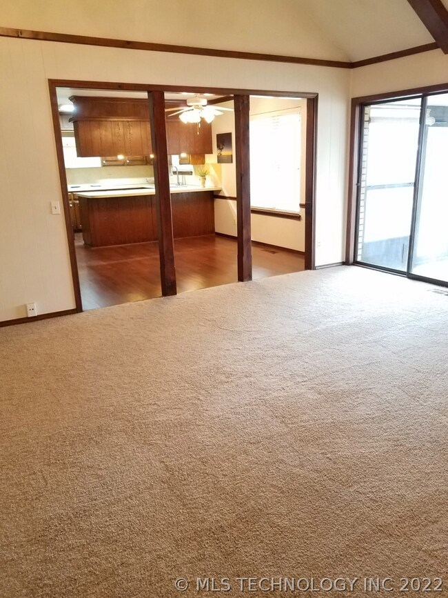 Looking towards kitchen and breakfast nook from living.