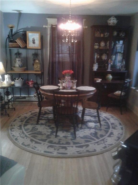Dining area has a window seat and plenty of room f