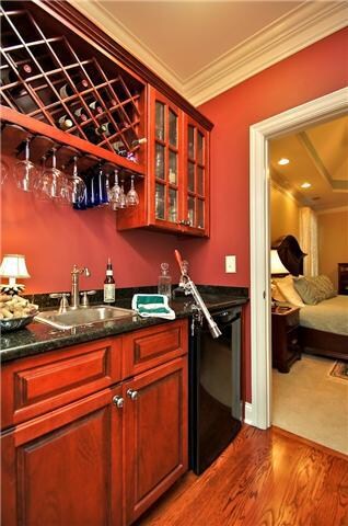 Wine bar, with Chiller, Wine Rack, Wet Bar, near Office and Master Suite. One of 2 wet bars in home.