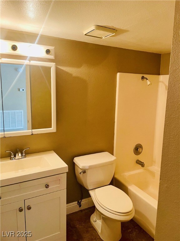 Full bathroom with toilet, tub / shower
