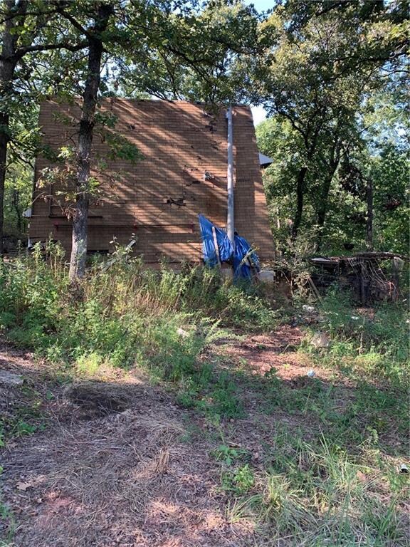 A-frame house on property built by previous owners