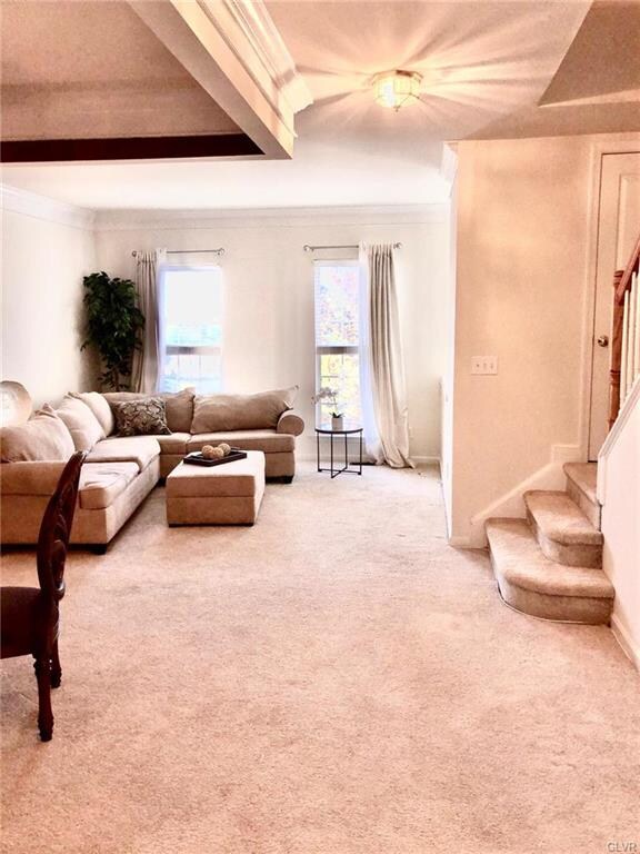 Light bright living room with dining area.
