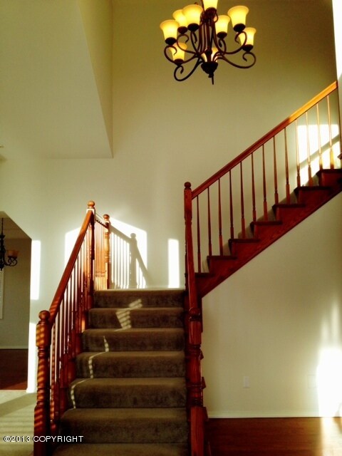 Vaulted entry with modern lighting