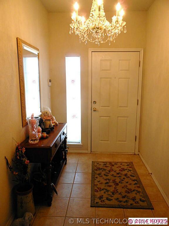Come on in! The Covered Porch opens to a ceramic t