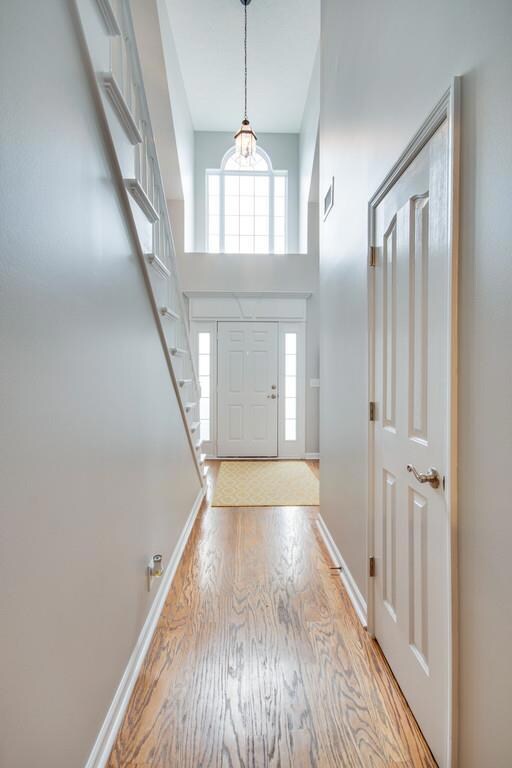 Welcome!  Feels like a new home with fresh paint, refinished floors, new carpet in Owner's Suite, and tile in Kitchen!