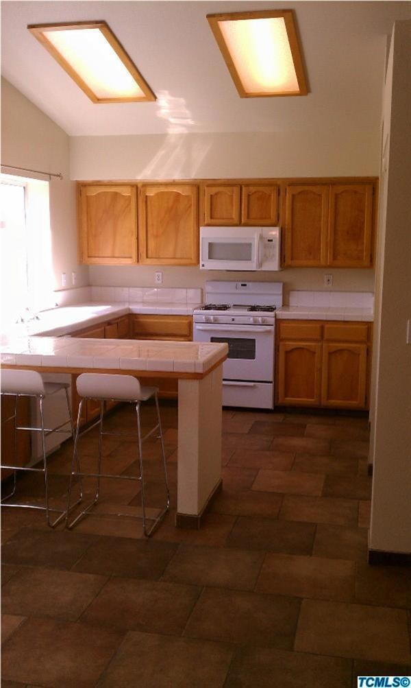 Large sunny kitchen with new appliances