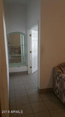 HALLWAY GLASS CABINET