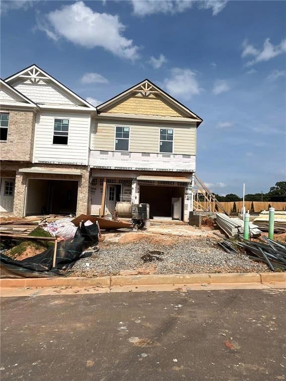 View of front of home featuring an attached garage