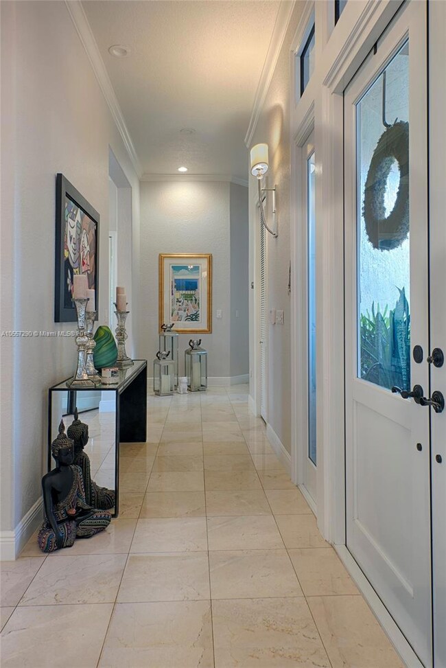 FOYER WITH GRANITE FLOORS.