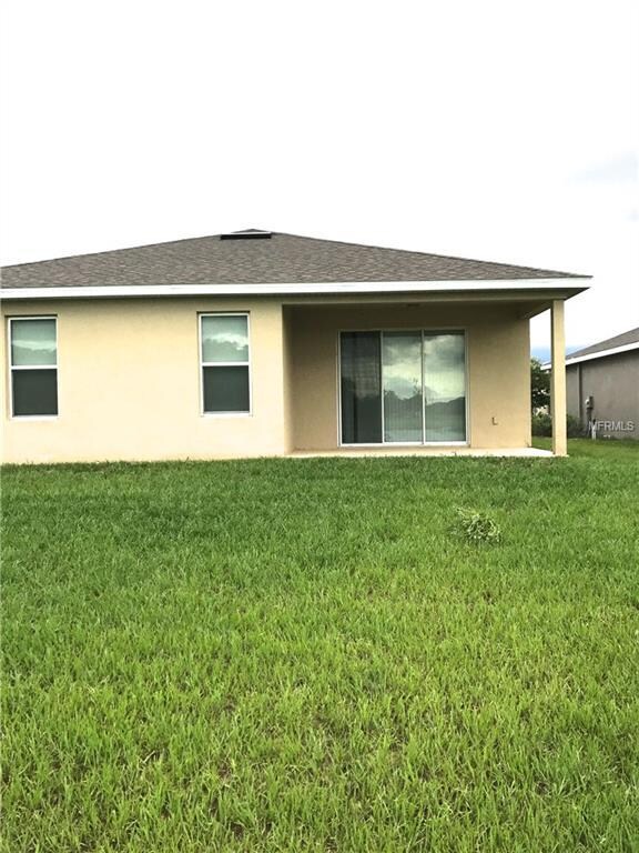 Large Back yard with Porch facing the POND