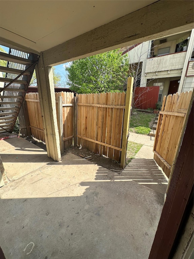 View of patio / terrace featuring fence