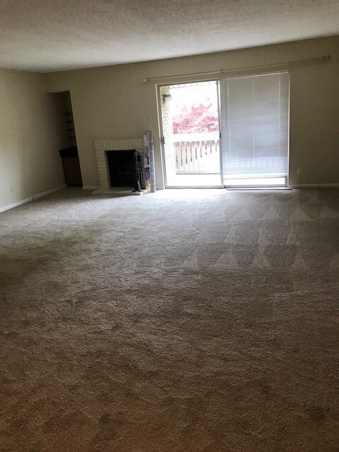 Large great room opens to the dining area and has 