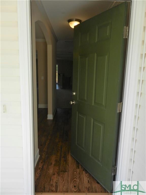 The entry has wood-look vinyl floors.