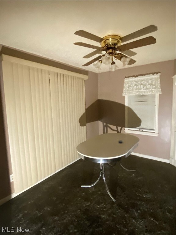 Dining room featuring ceiling fan