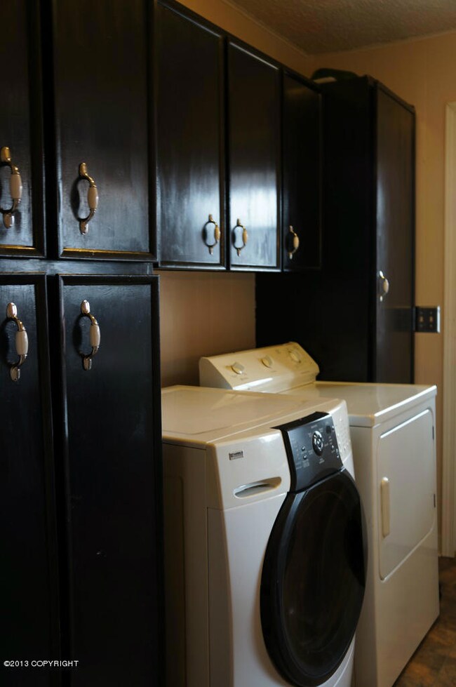 Laundry Area With Backyard Access
