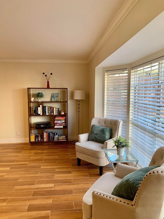 Large living room includes a reading nook