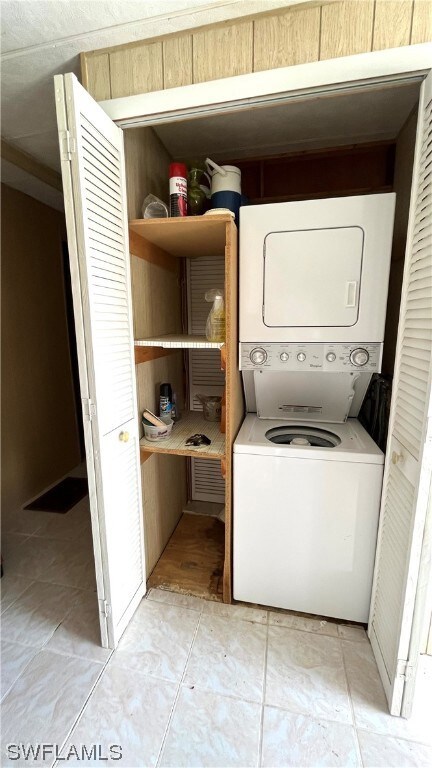 Stacking washer & dryer in the kitchen pantry.