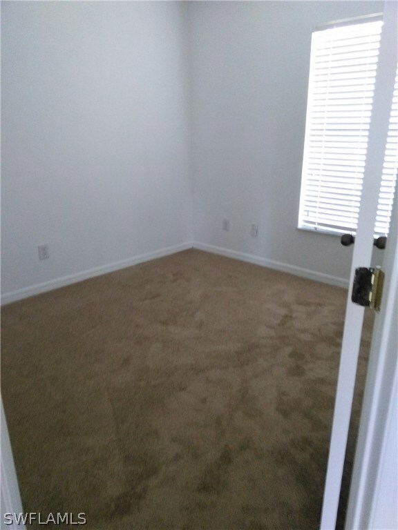 504 Ames St E, Lehigh Acres, FL 33974 - photo 4