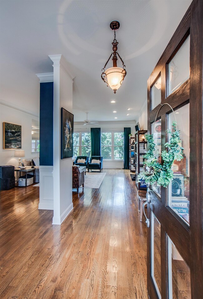 Enter from the covered front porch into this welcoming, light filled open floor plan.  