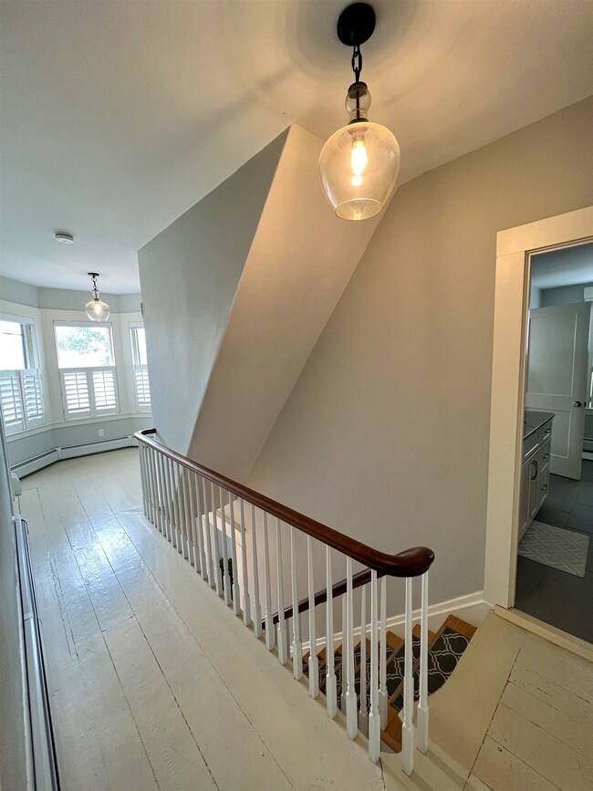 This elegant home also features modern light fixtu