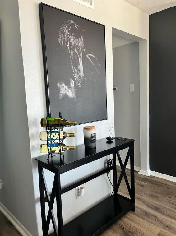 Home office featuring hardwood / wood-style floori