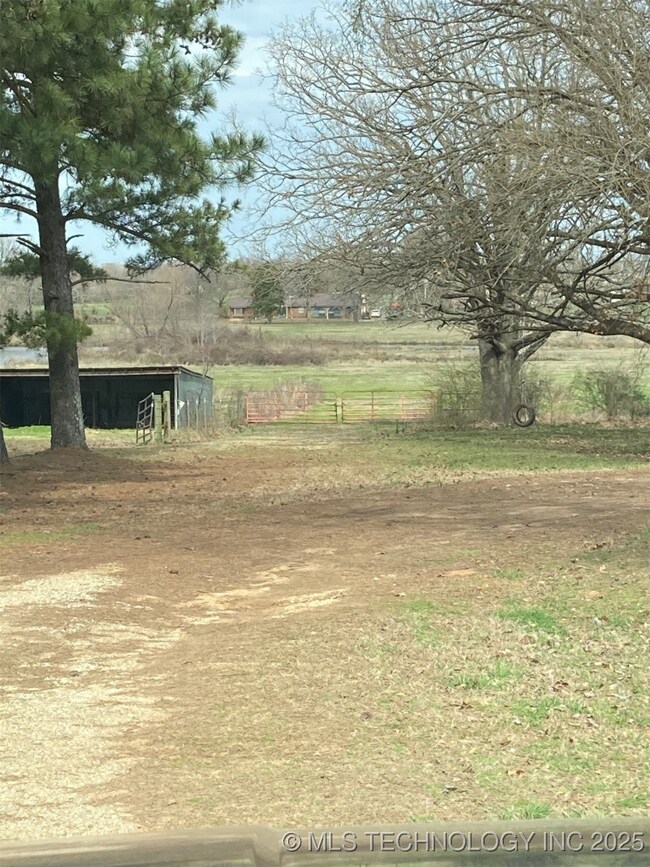 Gravel drive to gate to enter property