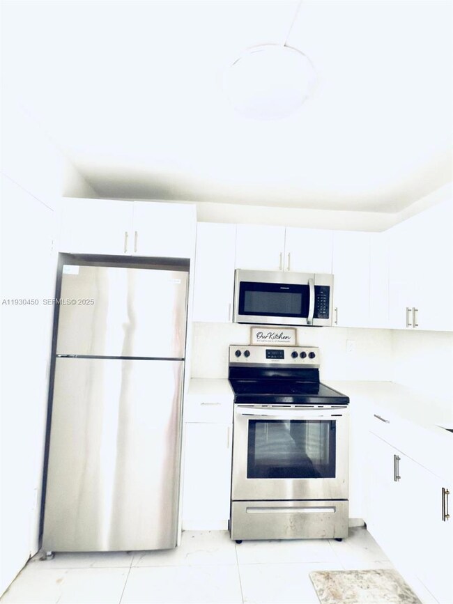 1401 NE 191st St unit D207, Miami, FL 33179 - photo 5