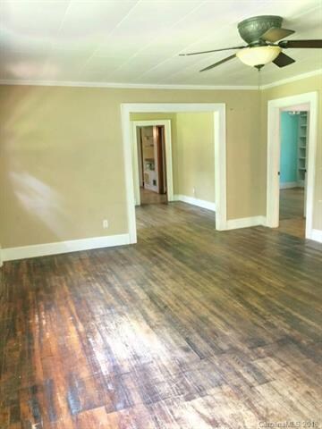 Living room open to the dining room.
