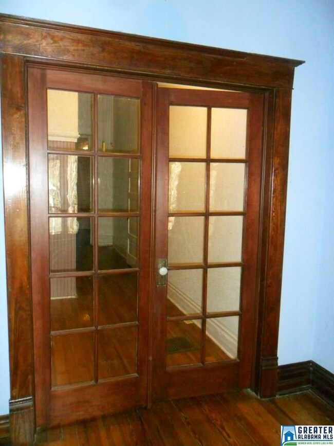 French doors to central hallway