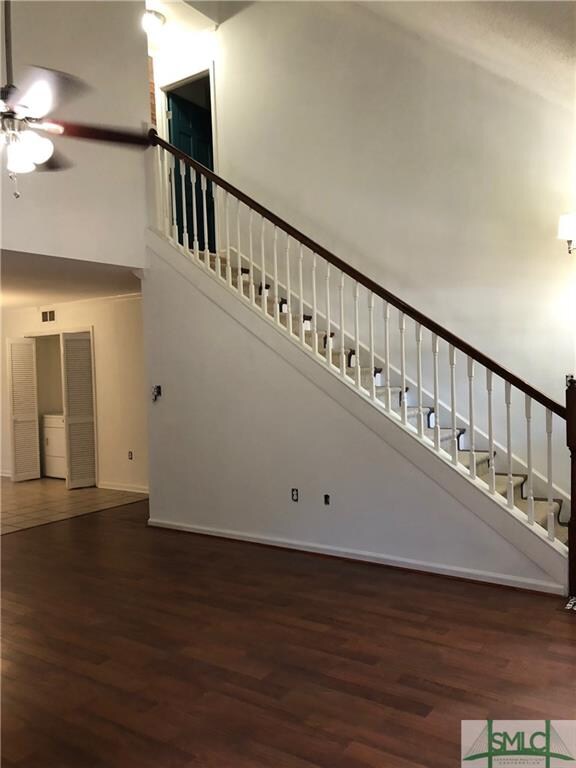 Wonderful high ceiling and an open staircase reall