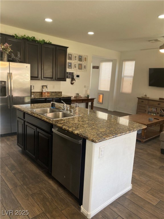 Kitchen featuring a large kitchen island with doub