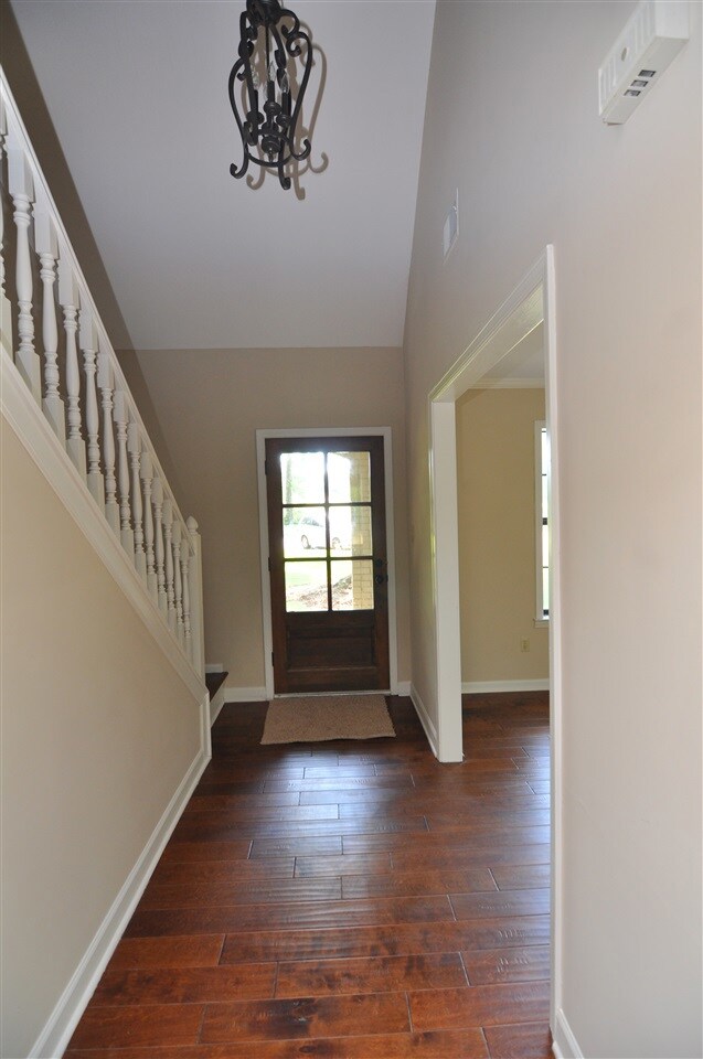 Step inside and be greeted by a lovely foyer with 